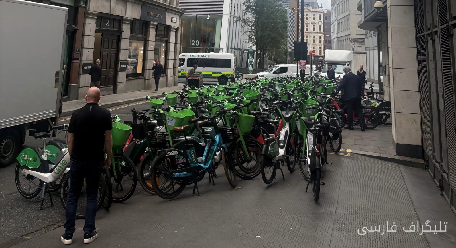 Blocking of Lime Street in London Due to Accumulation of Lime Bikes