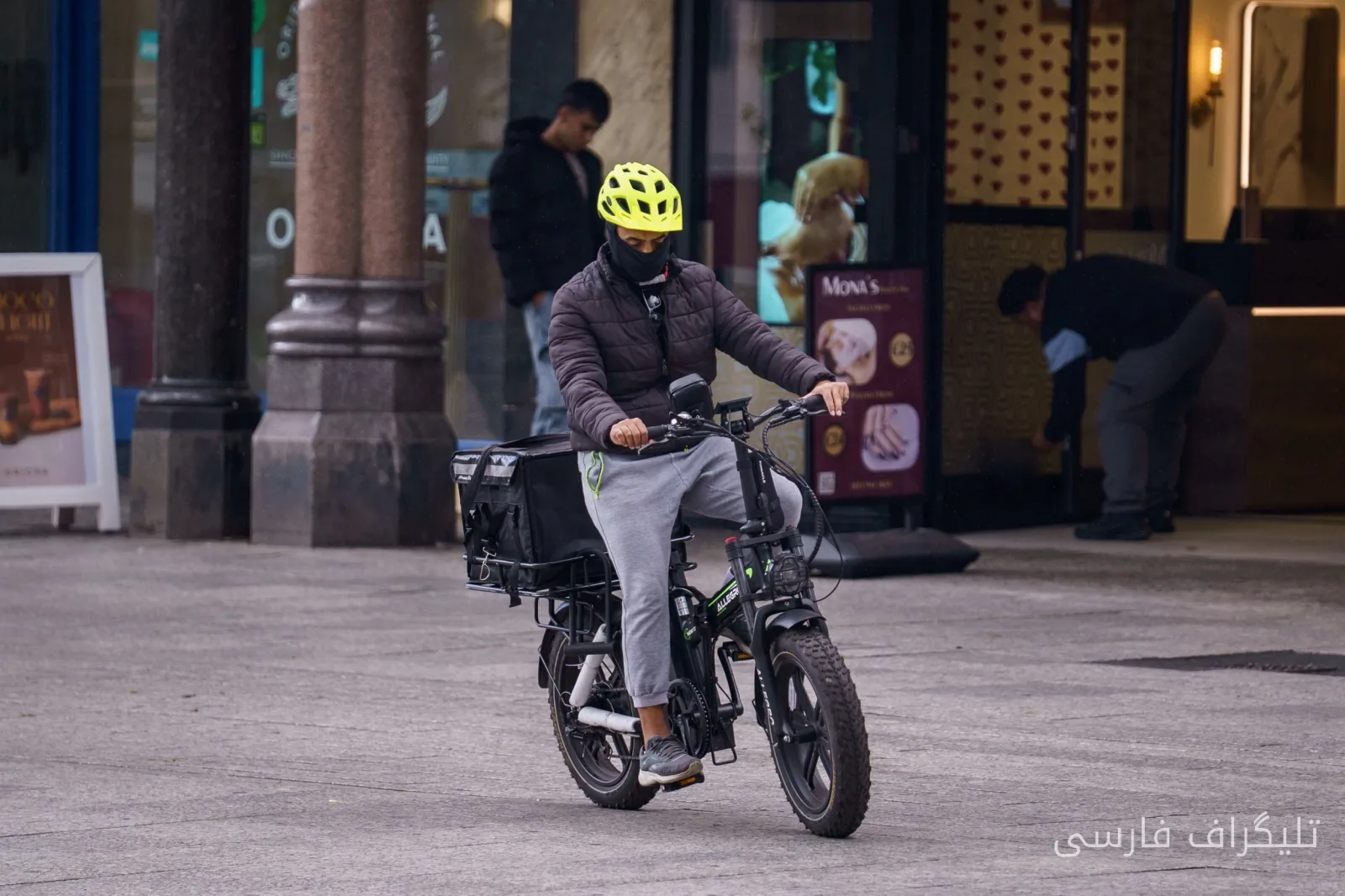 Masked men in Nottingham ignore face covering ban